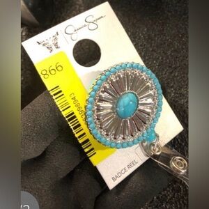 Jessica Simpson Turquoise Crystal Badge Reel